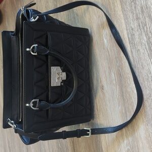 Michael Kors black quilted leather handbag w/ crossbody strap.